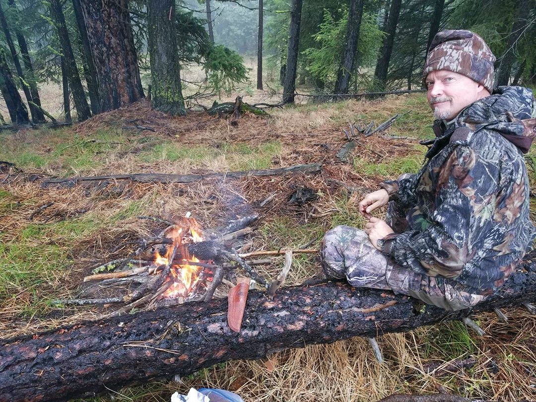 During the hunt, fog would often limit visibility. These were good times to keep warm by a fire and eat lunch, as Rob Mederos is doing.
